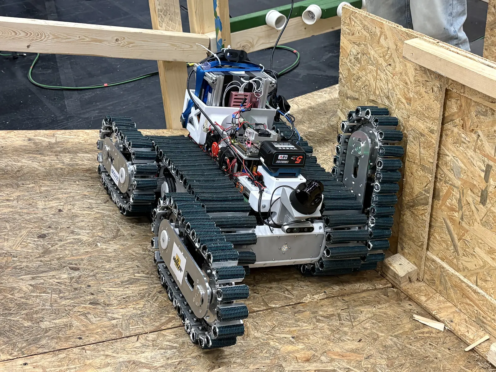 TUBer, our tracked rescue robot, inside the plywood test arena